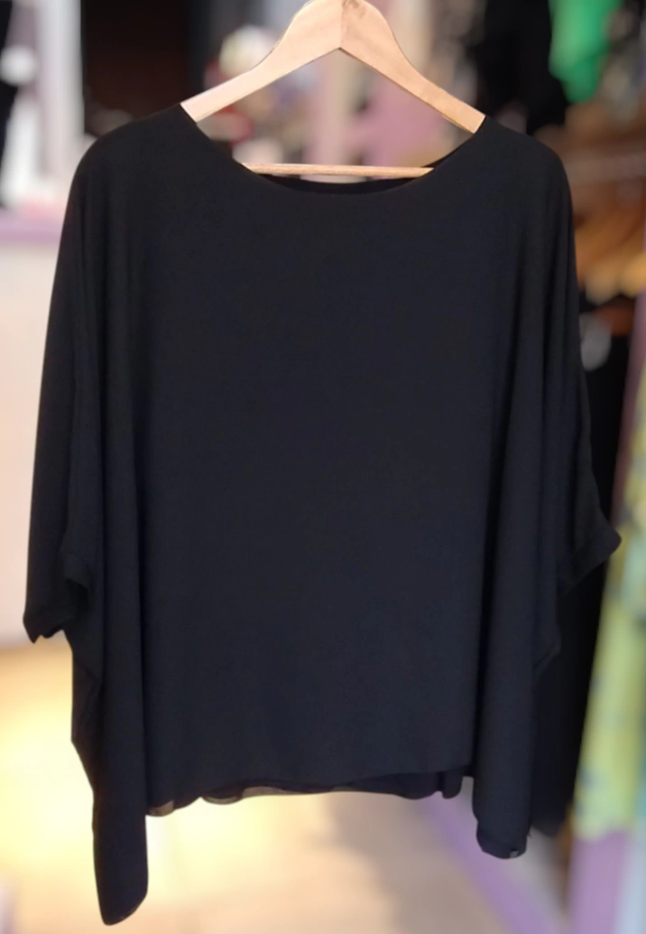 Blusa superpuesta